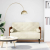 Sofa dwuosobowa z poduszkami w kolorze kremowym 110 cm