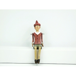 Figurka Pinokio siedzący